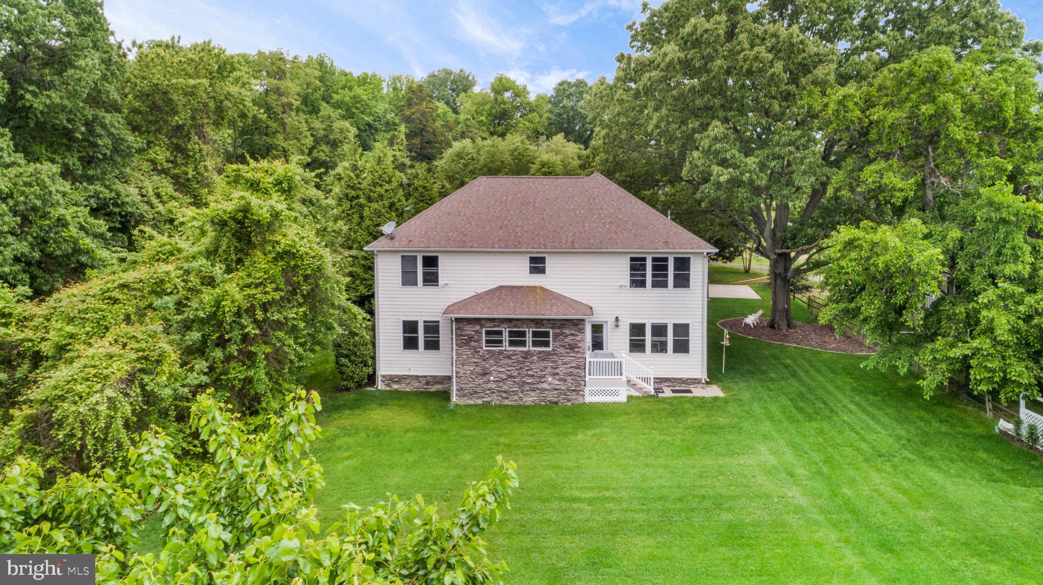 1457 Nieman Road Shady Side, MD 20764 - Photo 45 of 49 a front view of a house with a garden