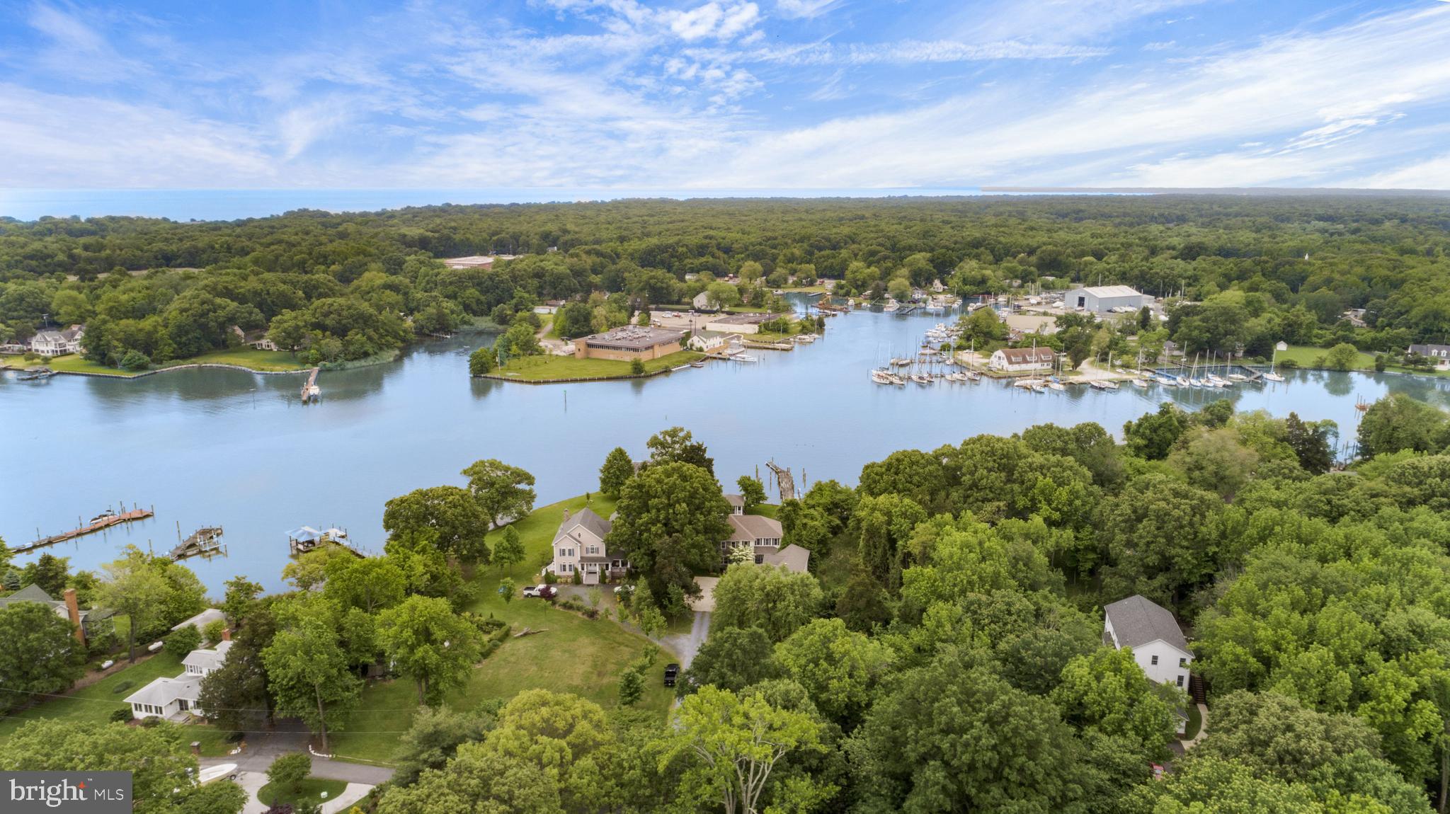 1457 Nieman Road Shady Side, MD 20764 - Photo 48 of 49 an aerial view of residential houses with outdoor space and lake view
