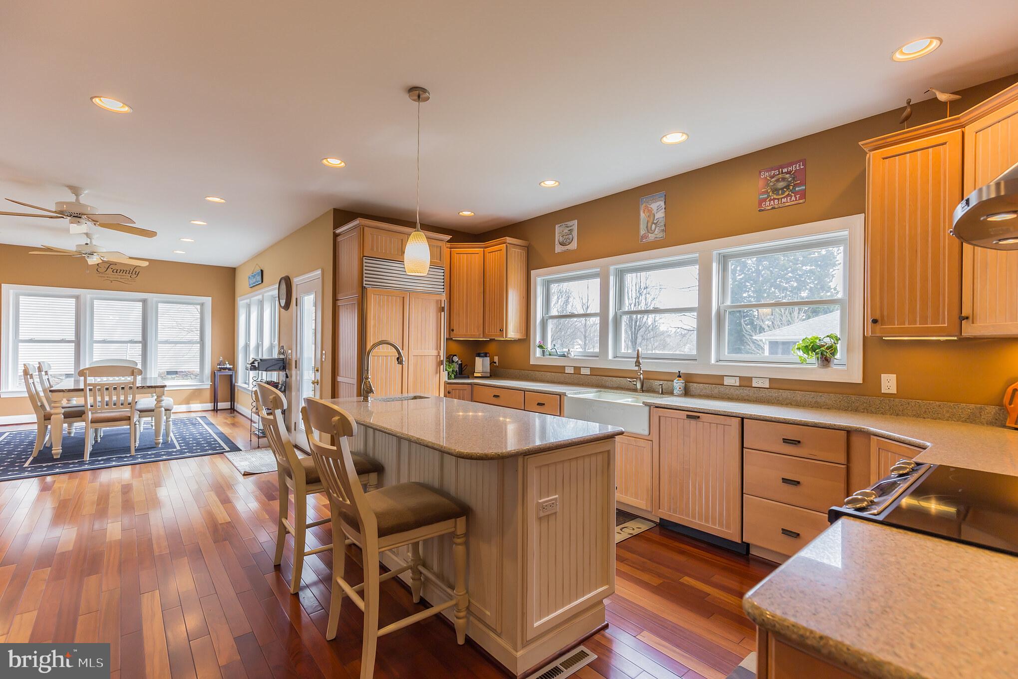 1457 Nieman Road Shady Side, MD 20764 - Photo 8 of 49 a large kitchen with lots of counter space a sink and appliances