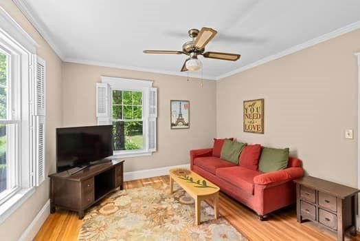 21 Fairview Road Needham, MA 02492 - Photo 14 of 28 a living room with furniture and a flat screen tv