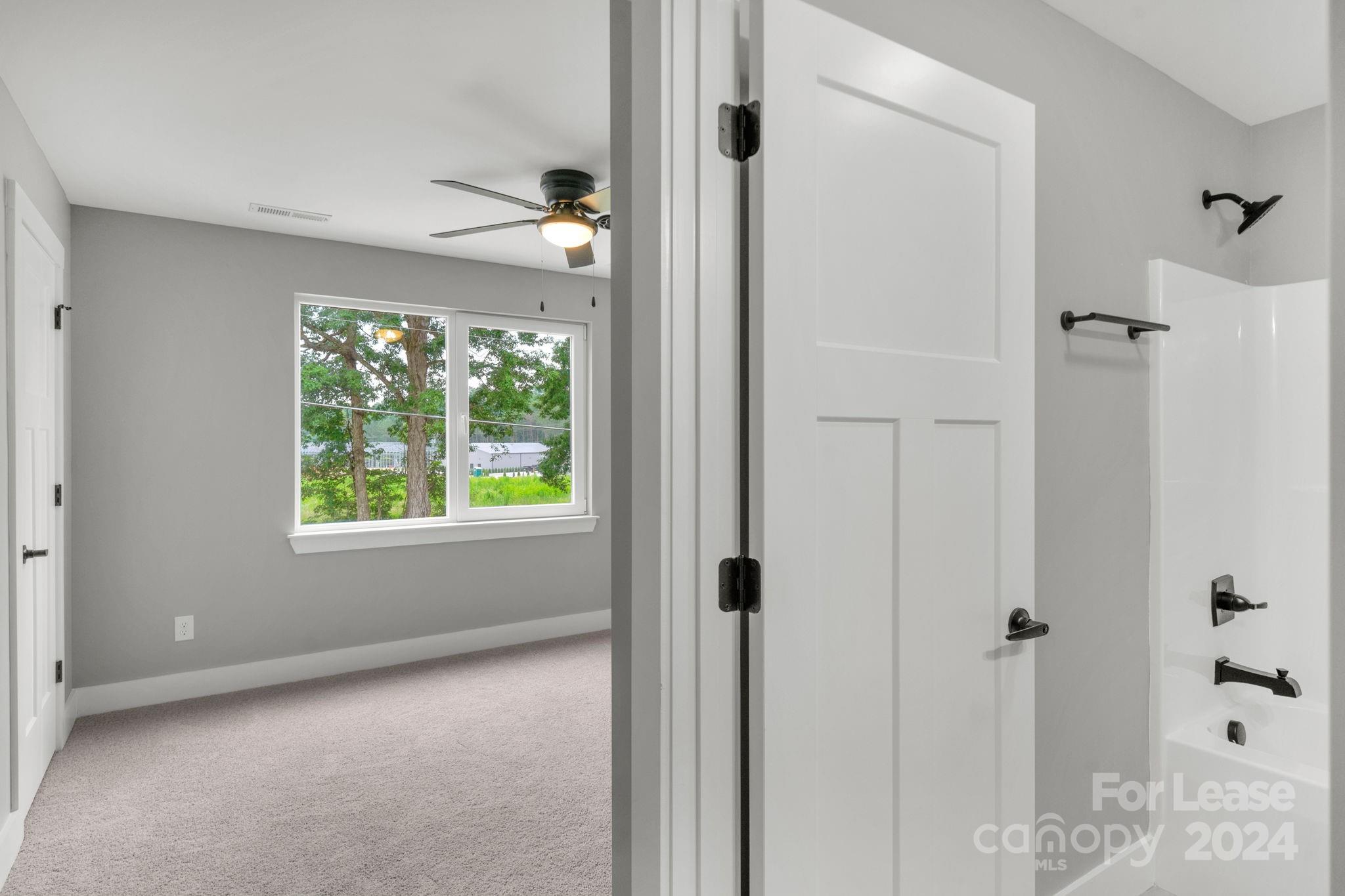 1112 Petes Road Lincolnton, NC 28092 - Photo 13 of 21 a view of an empty room with a window