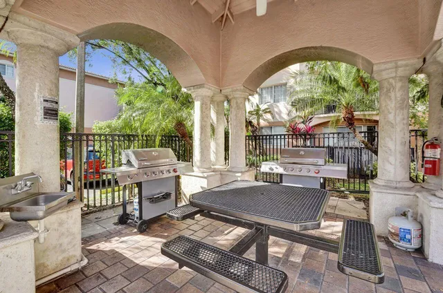 a living room with patio furniture