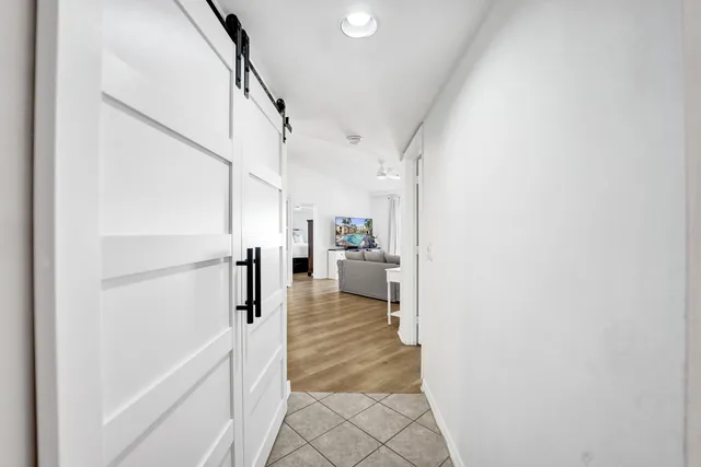 a view of a hallway view with staircase