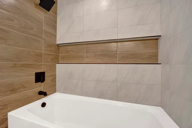a bathroom with a bathtub