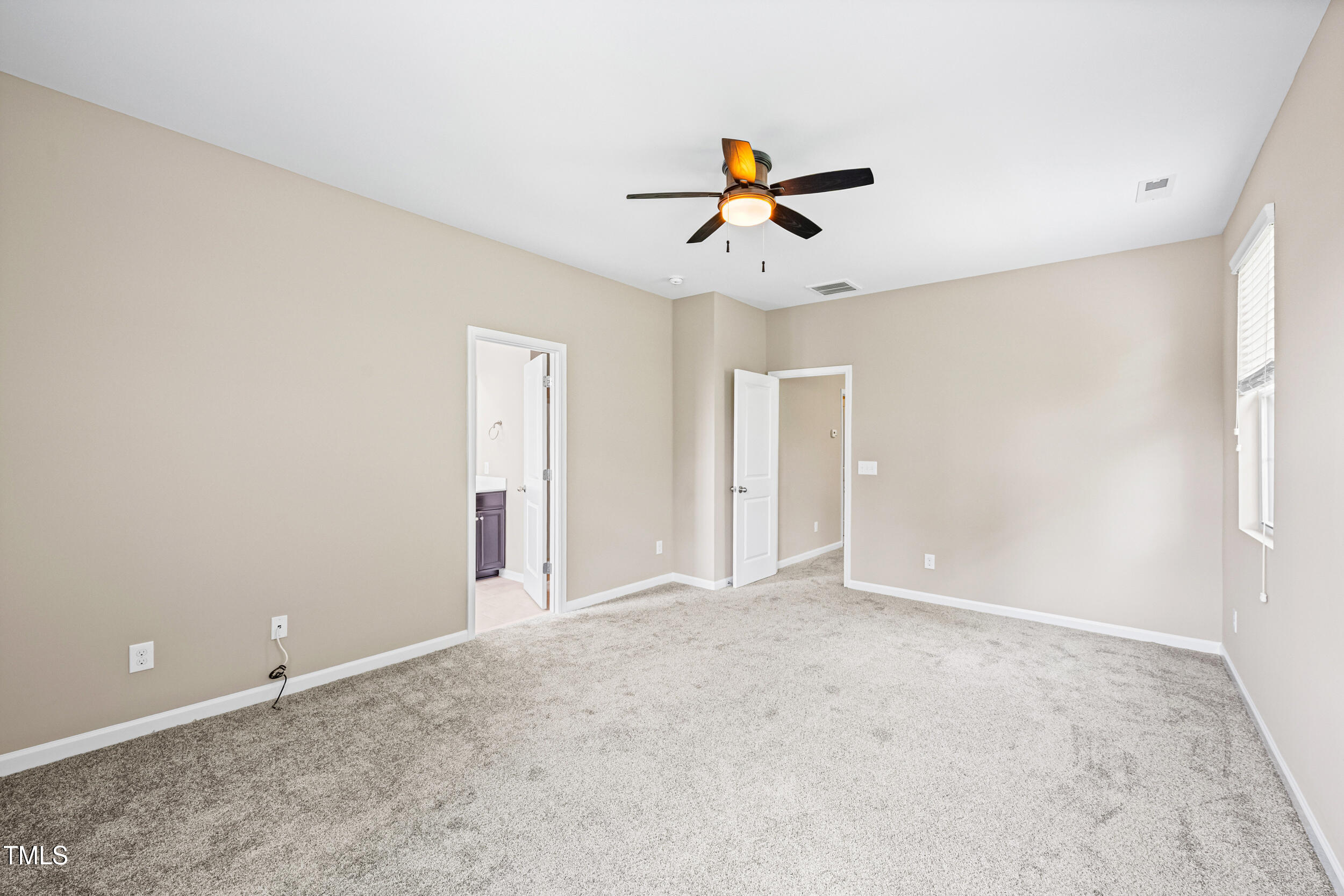 677 Wickham Ridge Road Apex, NC 27539 - Photo 22 of 34 a view of an empty room