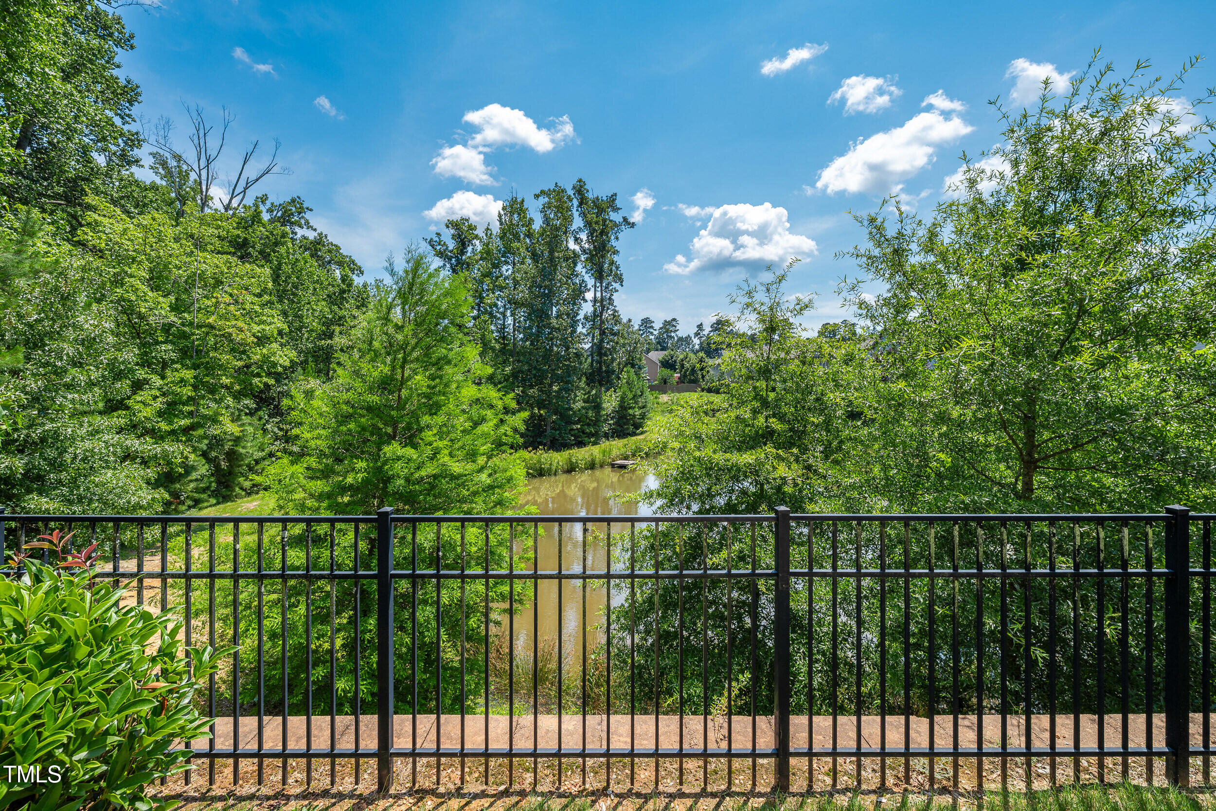 677 Wickham Ridge Road Apex, NC 27539 - Photo 4 of 34 a view of a fence