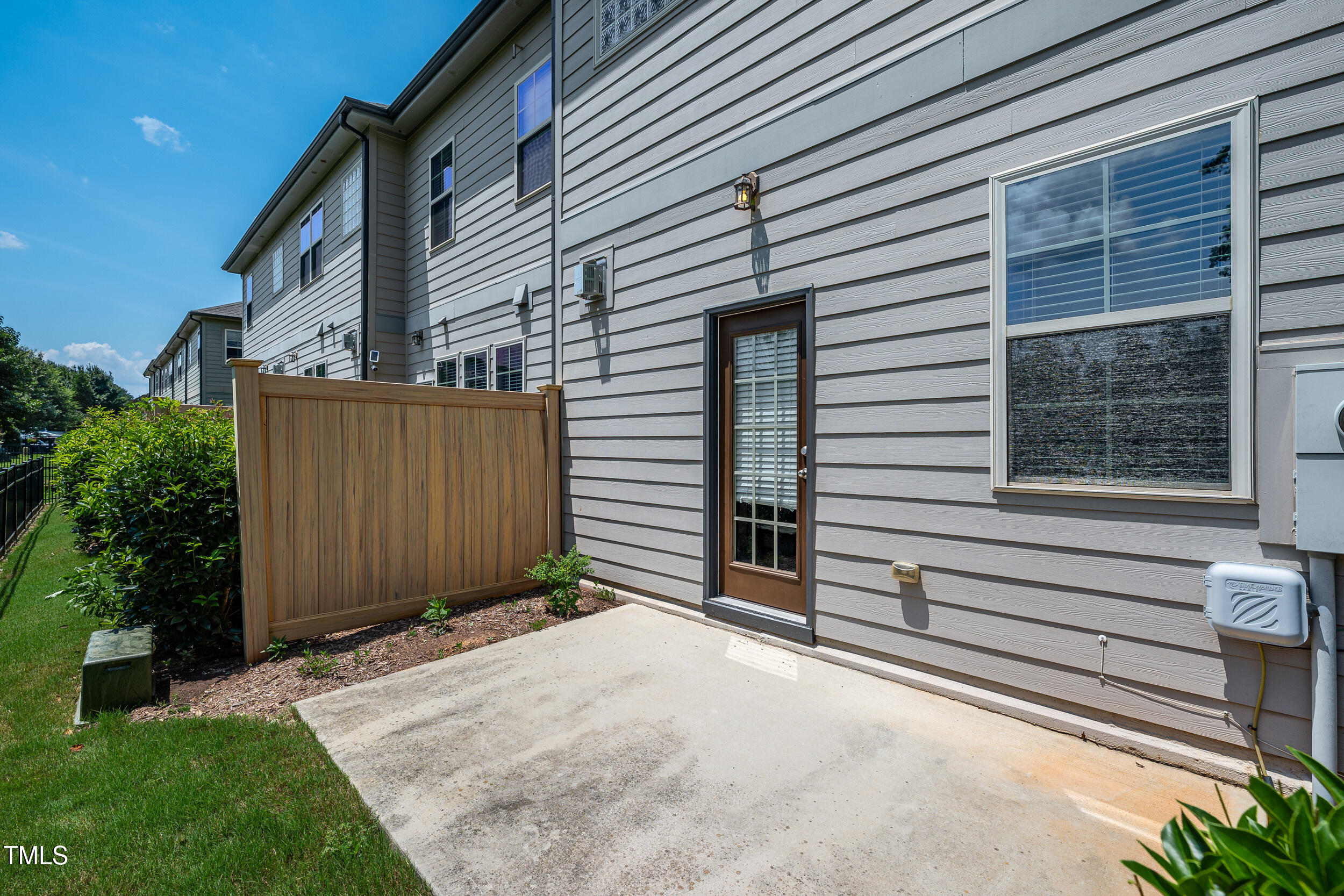 677 Wickham Ridge Road Apex, NC 27539 - Photo 5 of 34 a view of a house with a backyard