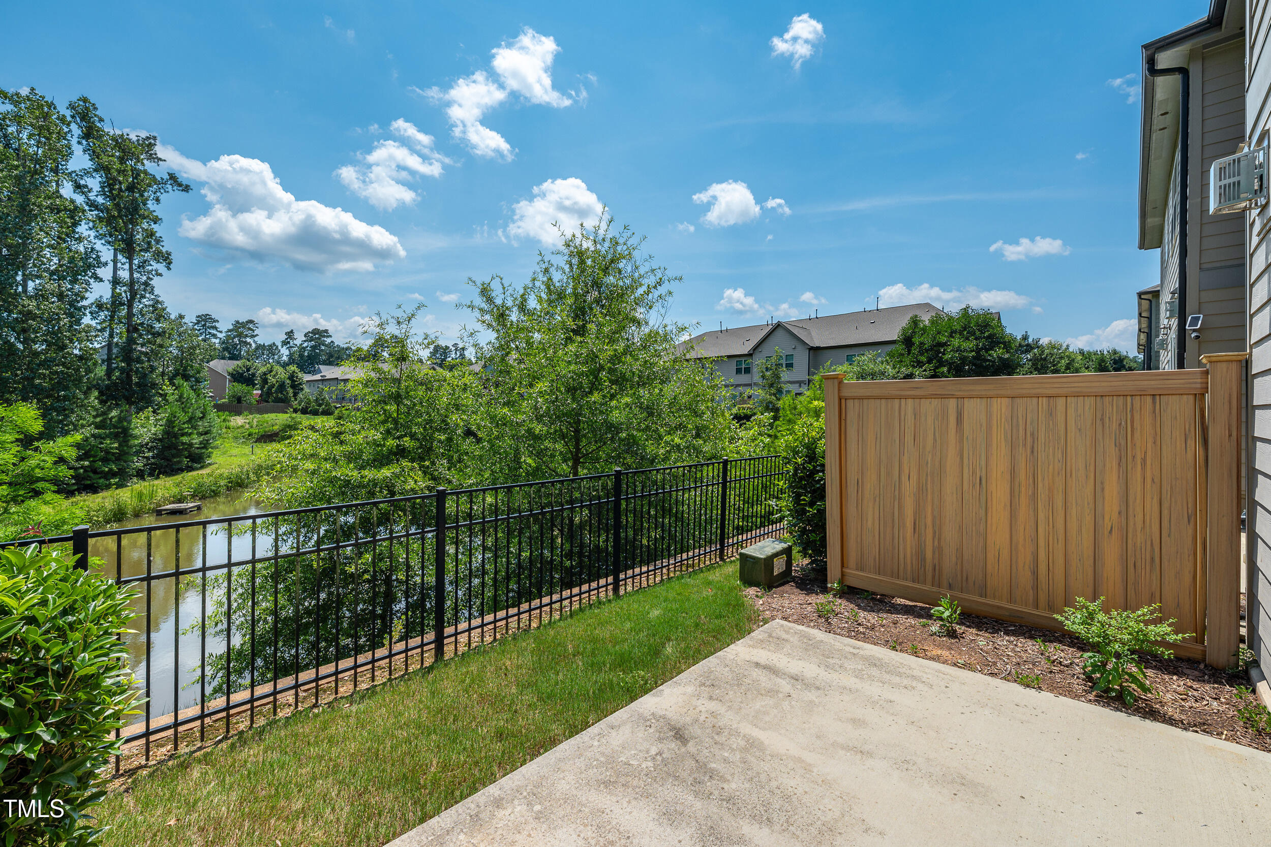 677 Wickham Ridge Road Apex, NC 27539 - Photo 6 of 34 a view of a backyard