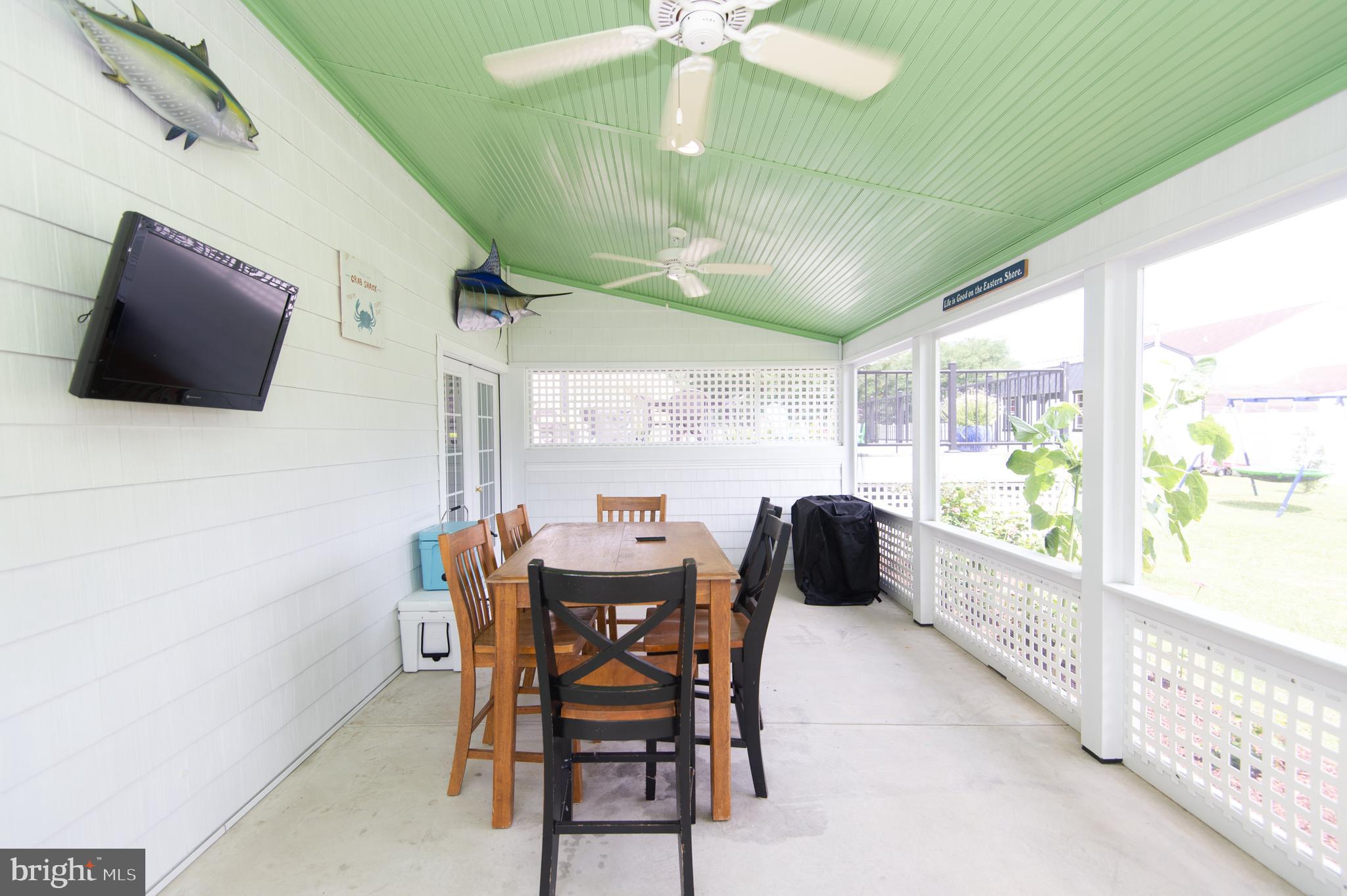 8 Sandy Acres Road Cambridge, MD 21613 - Photo 49 of 55 screened porch