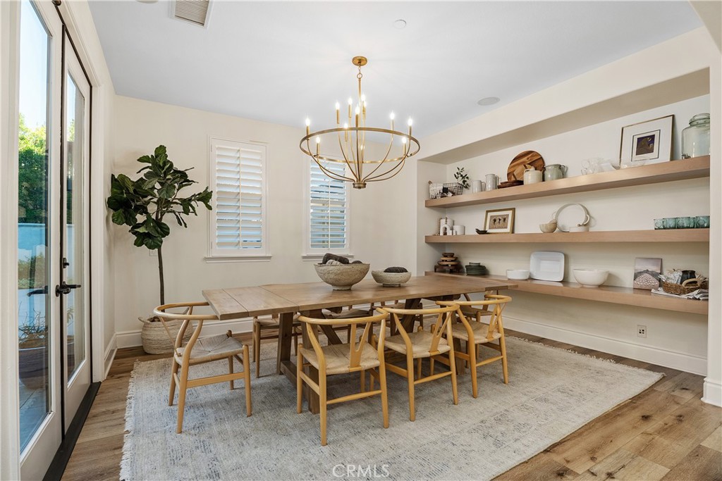 32 Michael Ladera Ranch, CA 92694 - Photo 13 of 44 a view of a dining room with furniture window and wooden floor