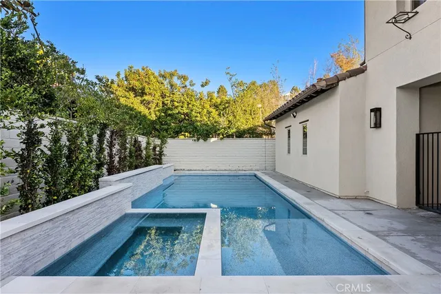 a view of a back yard of the house