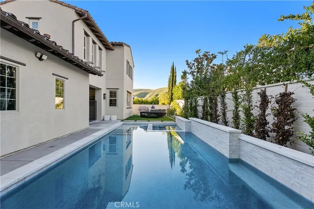a view of a swimming pool with a porch