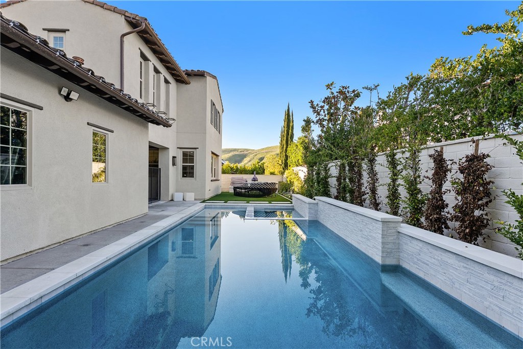 32 Michael Ladera Ranch, CA 92694 - Photo 15 of 44 a view of a swimming pool with a porch