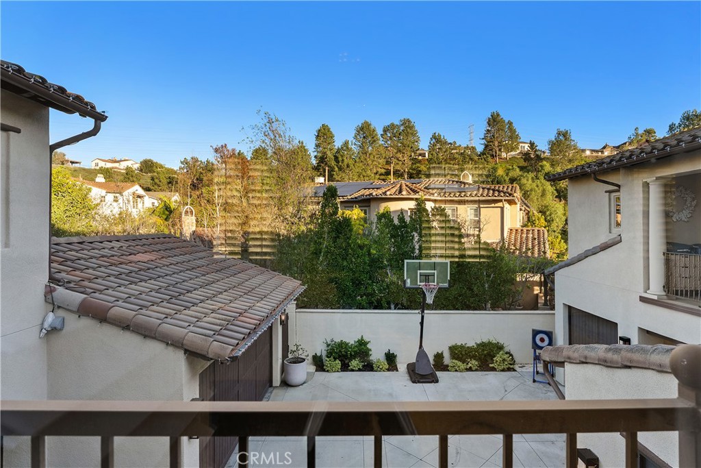 32 Michael Ladera Ranch, CA 92694 - Photo 21 of 44 a view of roof deck with a barbeque and wooden stairs