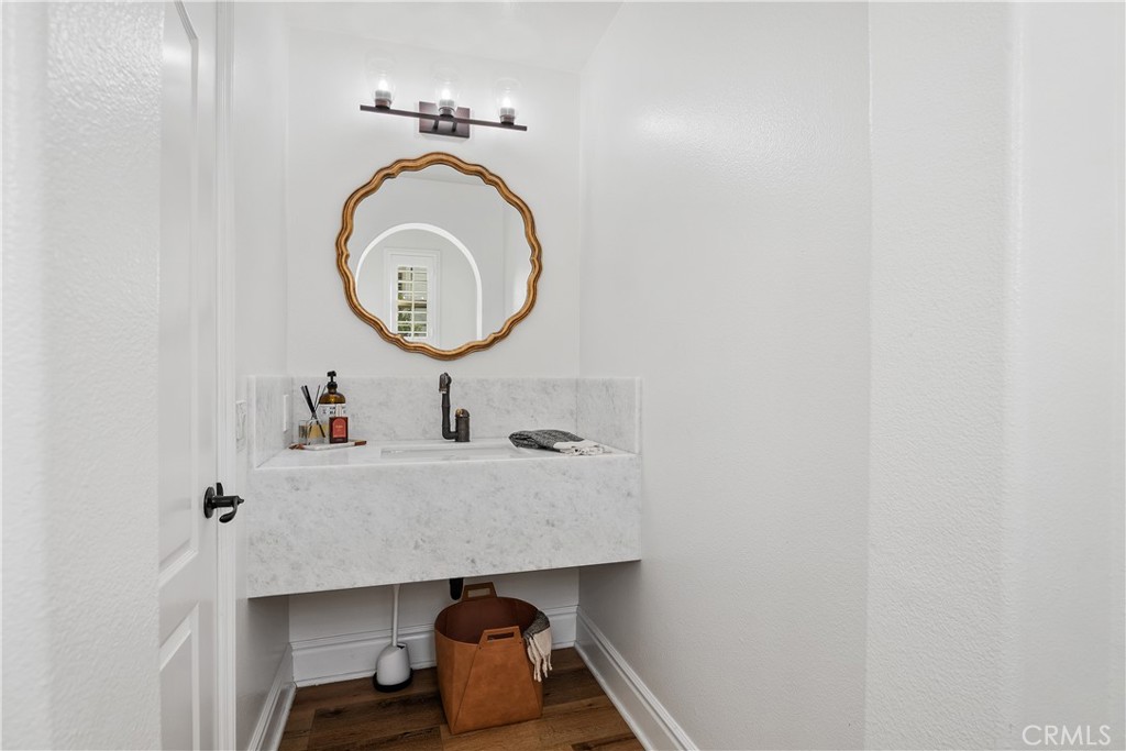 32 Michael Ladera Ranch, CA 92694 - Photo 23 of 44 a bathroom with a sink and a mirror