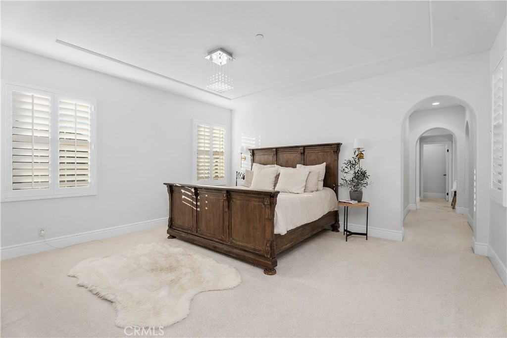 32 Michael Ladera Ranch, CA 92694 - Photo 26 of 44 a spacious bedroom with a bed and a cabinets