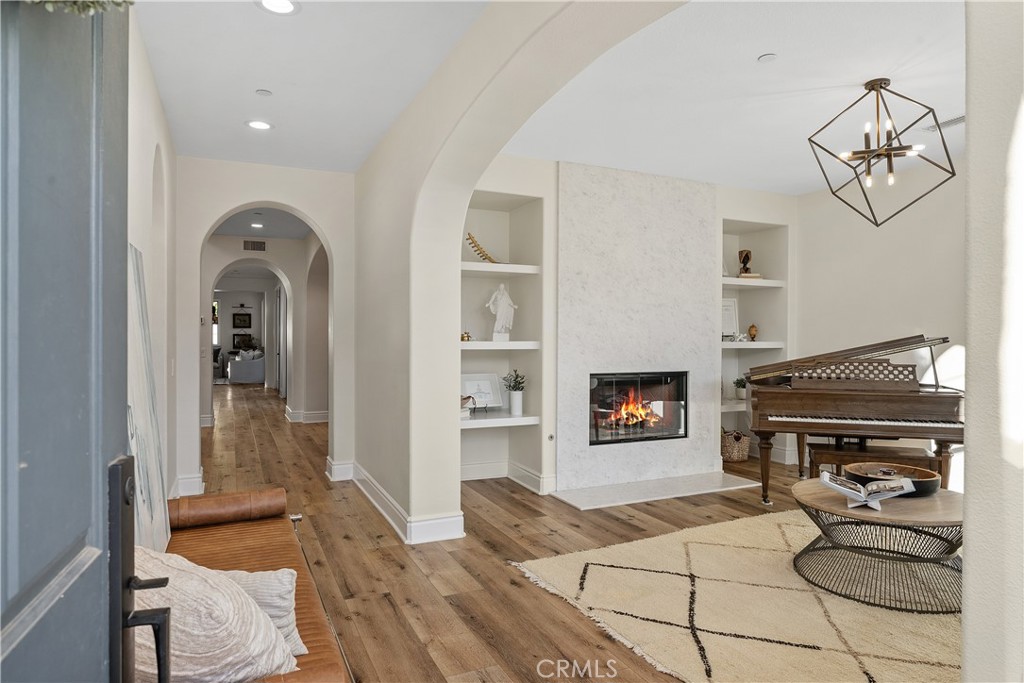 32 Michael Ladera Ranch, CA 92694 - Photo 3 of 44 a living room with furniture a fireplace and a flat screen tv