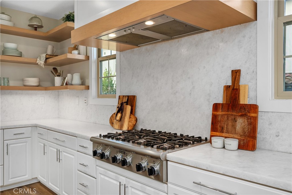 32 Michael Ladera Ranch, CA 92694 - Photo 7 of 44 a stove top oven sitting inside of a kitchen