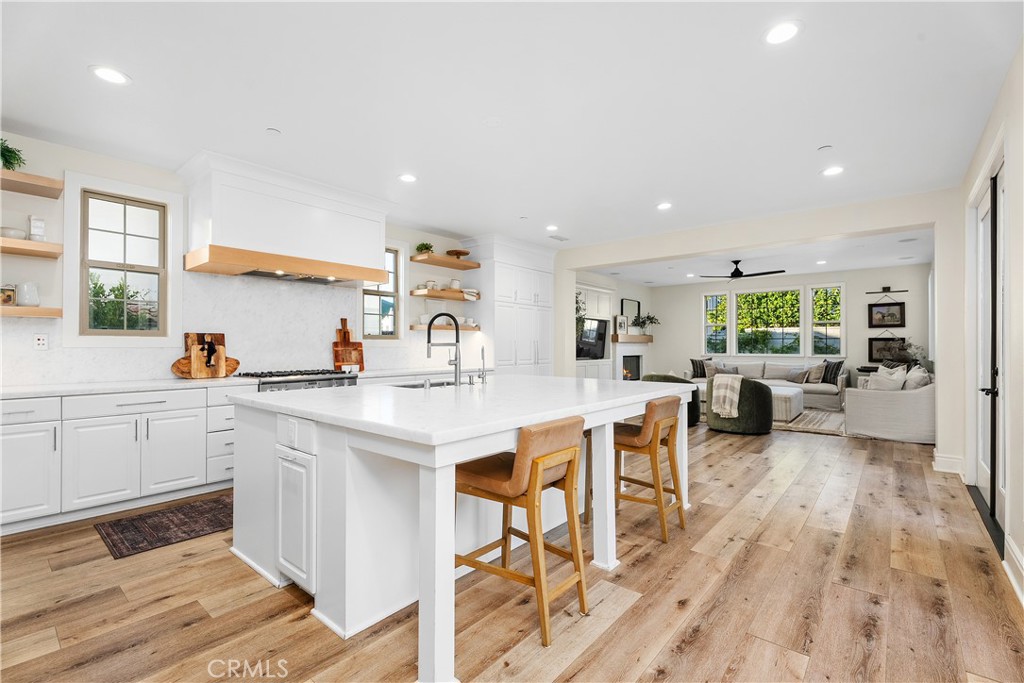 32 Michael Ladera Ranch, CA 92694 - Photo 9 of 44 a kitchen with a sink cabinets and wooden floor