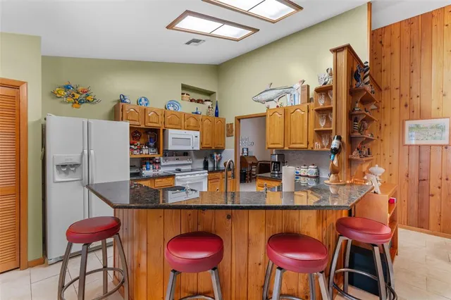 $355,000 | 14334 Raintree Boulevard, Grand Island, FL 32735