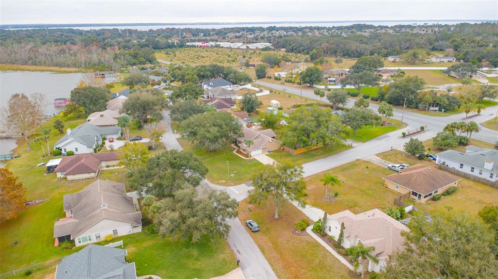 14334 Raintree Boulevard Grand Island, FL 32735 - Photo 37 of 40 an aerial view of residential houses with outdoor space