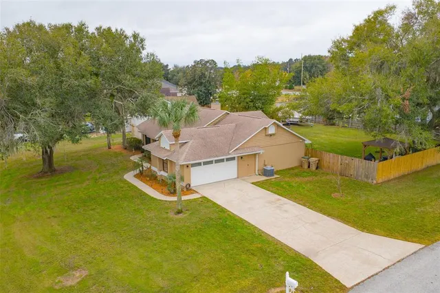$355,000 | 14334 Raintree Boulevard, Grand Island, FL 32735