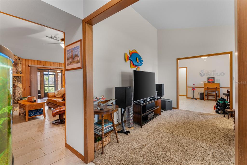 14334 Raintree Boulevard Grand Island, FL 32735 - Photo 7 of 40 a view of a livingroom with workspace and a couch