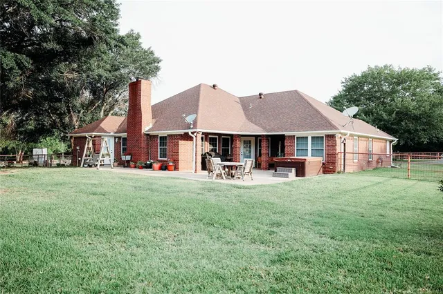 a view of an couches in front of house