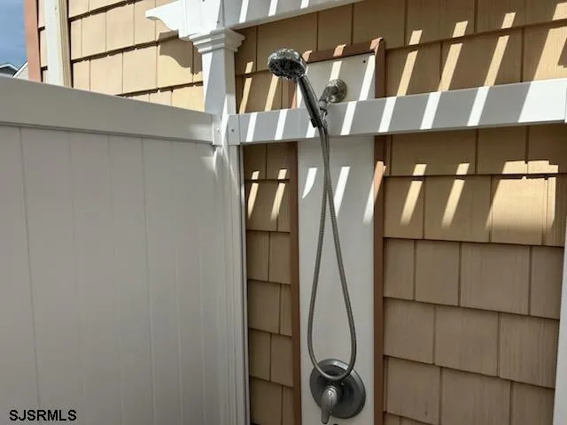 a view of staircase with utility room