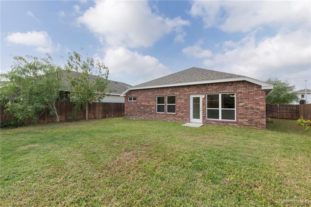 14337 Chalk Rdg Drive McAllen, TX 78504 - Photo 16 of 21 Spacious fenced backyard with mature trees and endless potential for your dream outdoor space