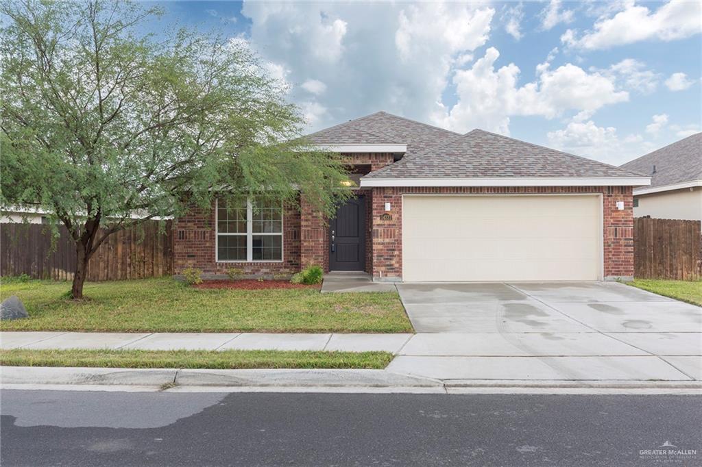 14337 Chalk Rdg Drive McAllen, TX 78504 - Photo 2 of 21 Beautiful curb appeal with a mature tree, spacious driveway and inviting brick exterior