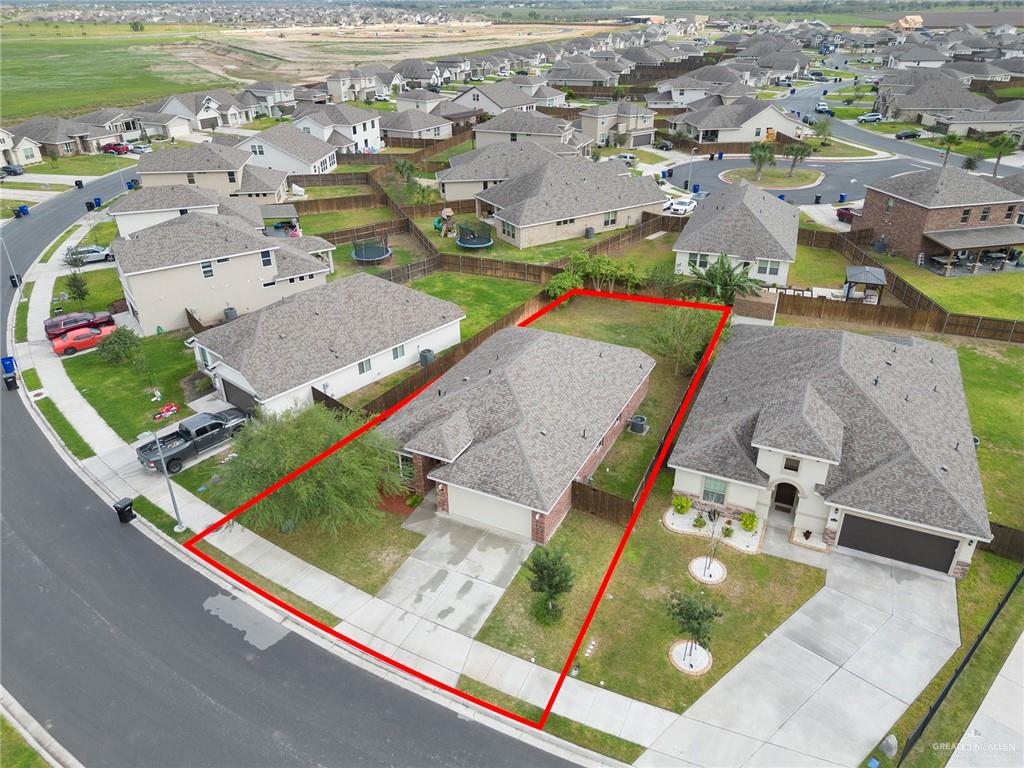 14337 Chalk Rdg Drive McAllen, TX 78504 - Photo 21 of 21 Aerial perspective highlighting the home’s corner lot, spacious yard and prime position within a growing community