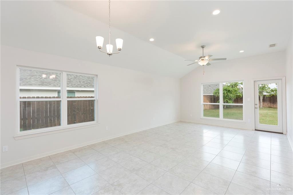 14337 Chalk Rdg Drive McAllen, TX 78504 - Photo 8 of 21 Bright and spacious living area with high ceilings, abundant natural light and direct access to the backyard