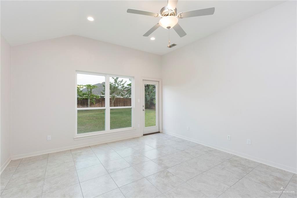 14337 Chalk Rdg Drive McAllen, TX 78504 - Photo 9 of 21 Spacious living area with high ceilings, modern finishes and large windows bringing in natural light