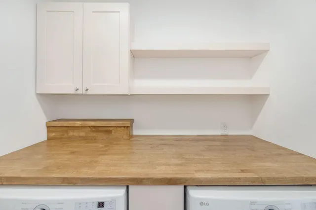 a view of a swimming pool and a yard