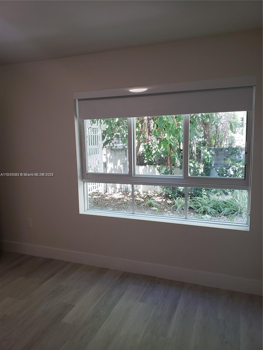 Ojus Miami, FL 33180 - Photo 11 of 13 a view of an empty room with a window