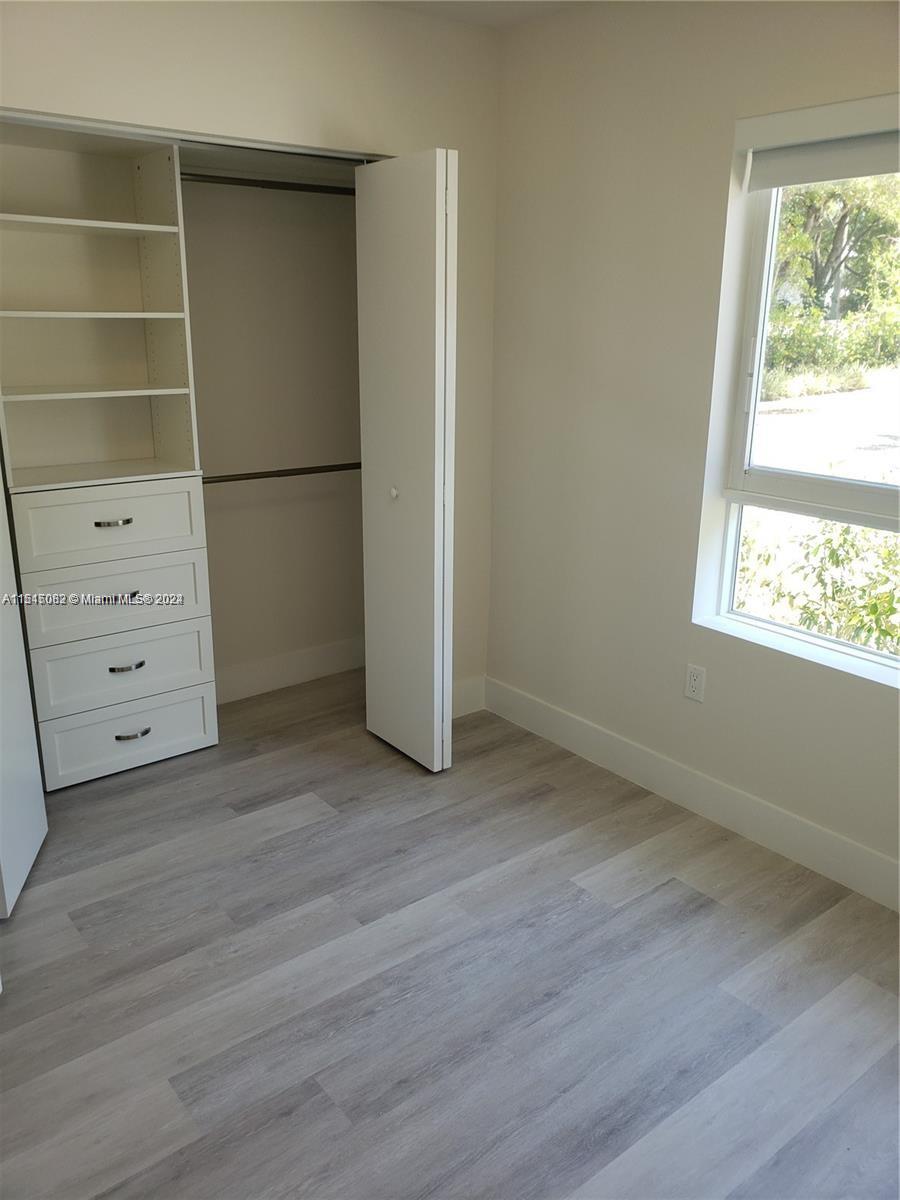 Ojus Miami, FL 33180 - Photo 6 of 13 a view of an empty room with a window