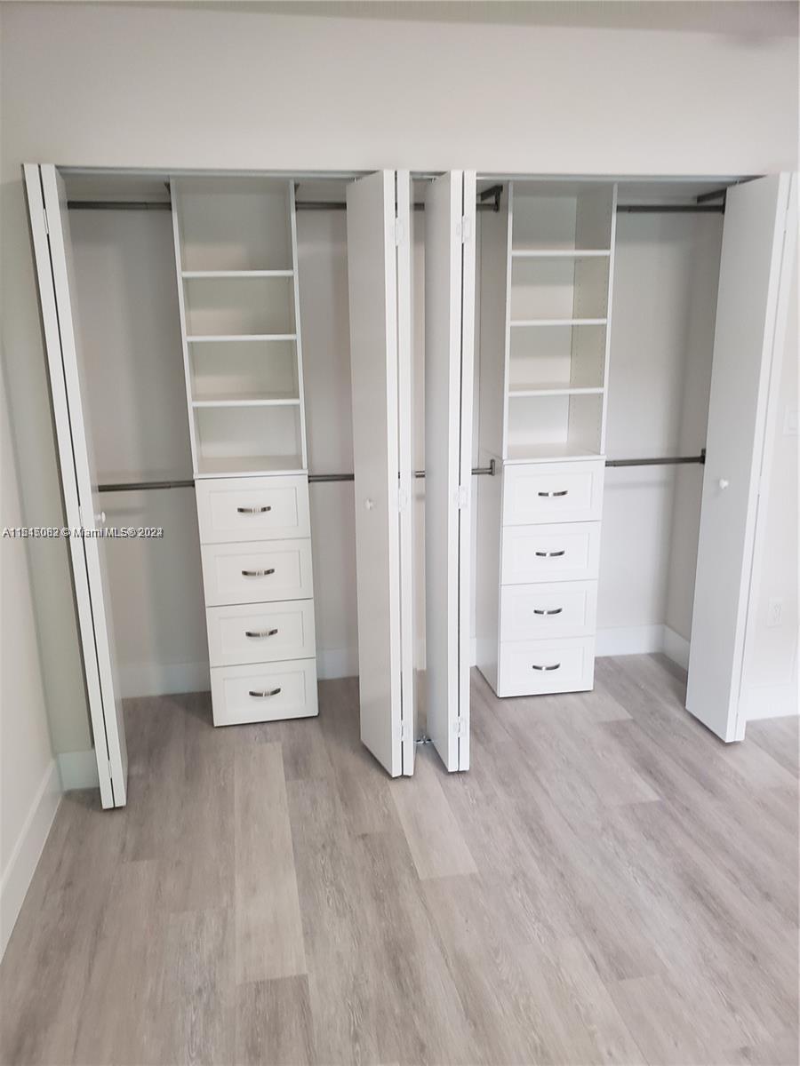 Ojus Miami, FL 33180 - Photo 9 of 13 wooden floor in an empty room