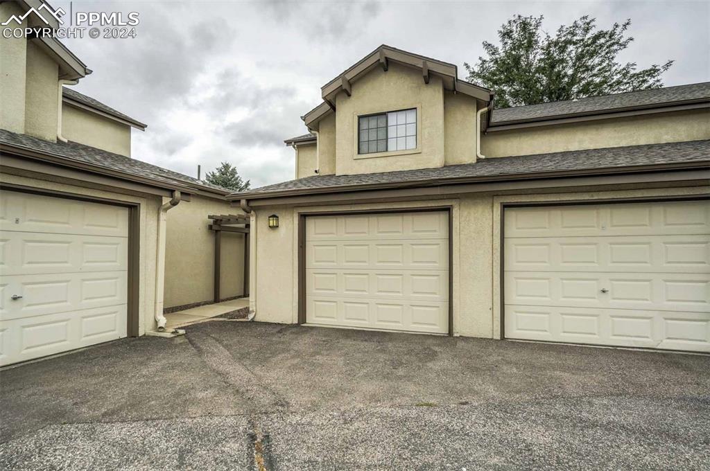 2195 Alicia Point, Unit 102 Colorado Springs, CO 80919 - Photo 26 of 36 front view of a house