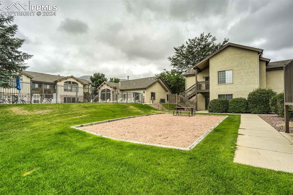 2195 Alicia Point, Unit 102 Colorado Springs, CO 80919 - Photo 36 of 36 a view of outdoor space yard deck and house