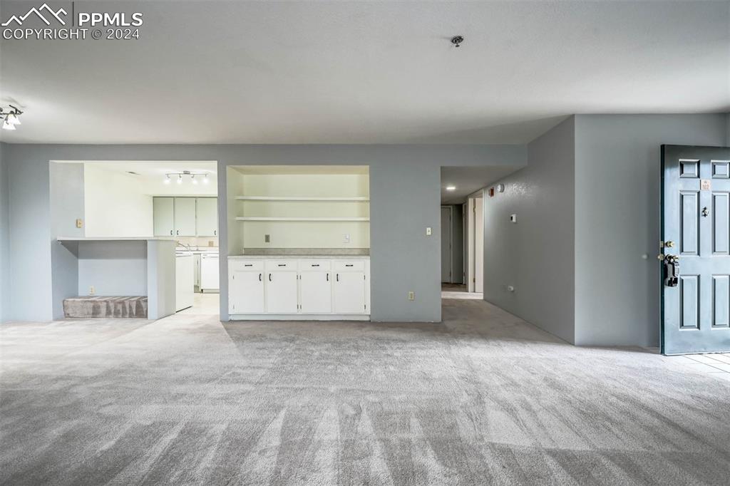 2195 Alicia Point, Unit 102 Colorado Springs, CO 80919 - Photo 6 of 36 a view of an empty room
