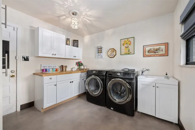 a view of a swimming pool with a patio