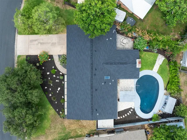 a patio with table and chairs