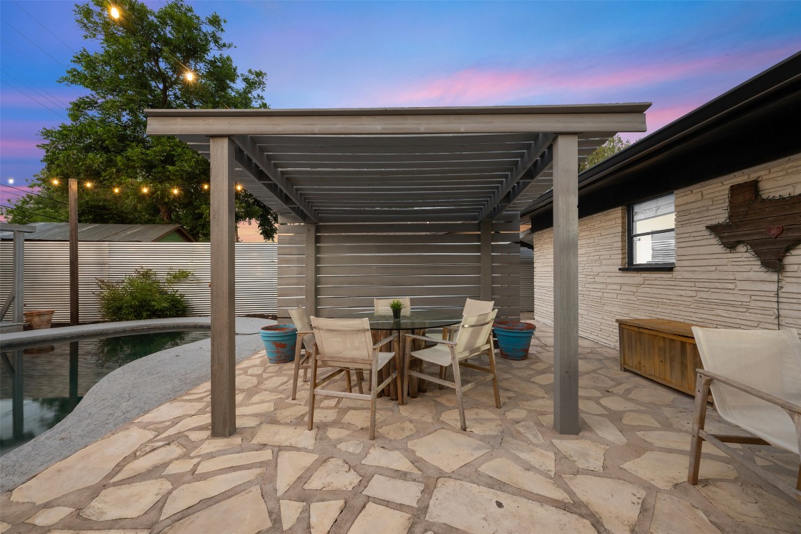 1806 Rogge Lane Austin, TX 78723 - Photo 33 of 40 a patio with table and chairs
