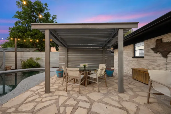 a view of an outdoor space and basketball court