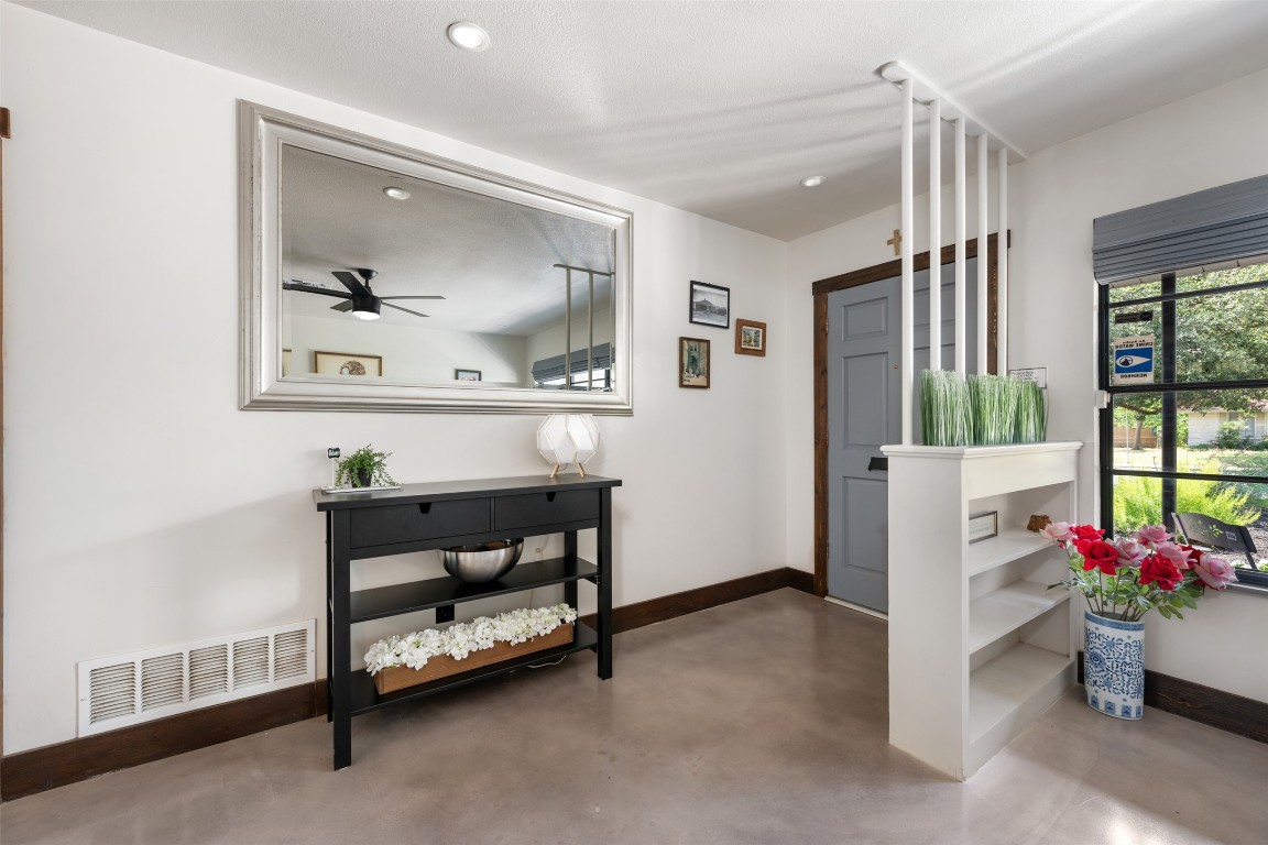 1806 Rogge Lane Austin, TX 78723 - Photo 8 of 40 a workspace with furniture and window