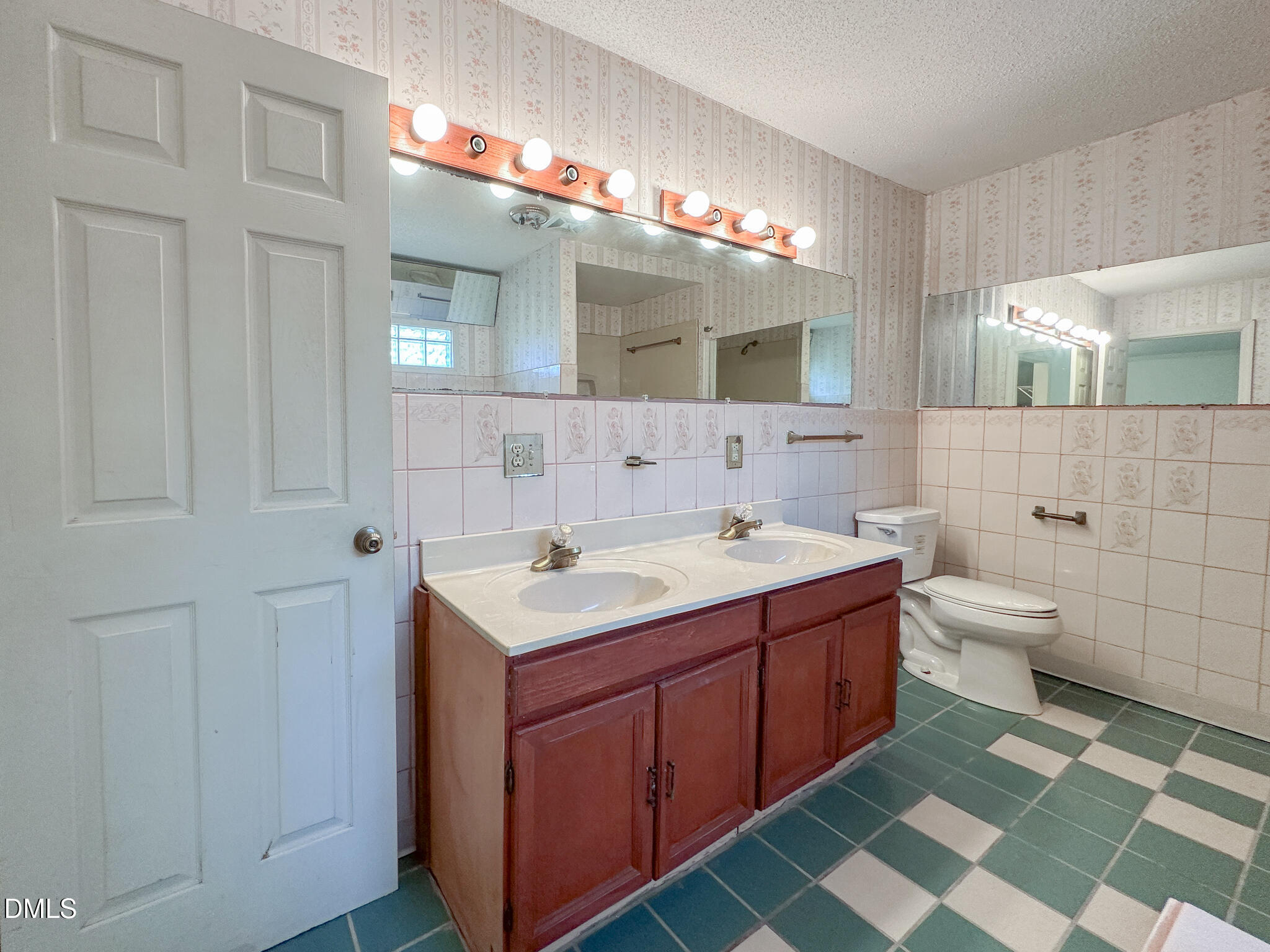 188 Jones Chapel Road Norlina, NC 27563 - Photo 55 of 71 a spacious bathroom with a double vanity sink mirror and toilet