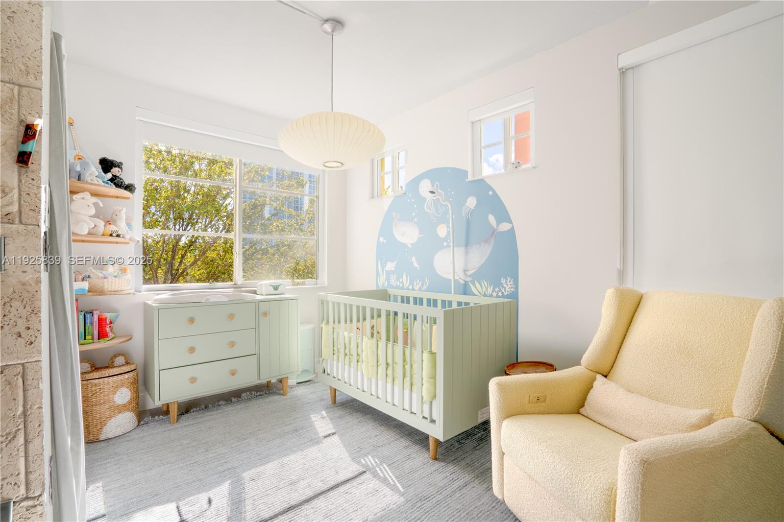 125 Jefferson Avenue, Unit 119 Miami Beach, FL 33139 - Photo 33 of 47 a bedroom with furniture and a window