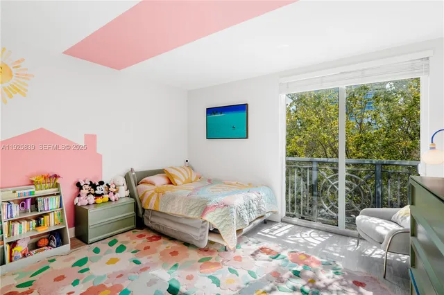 a bedroom with a bed and a book shelf