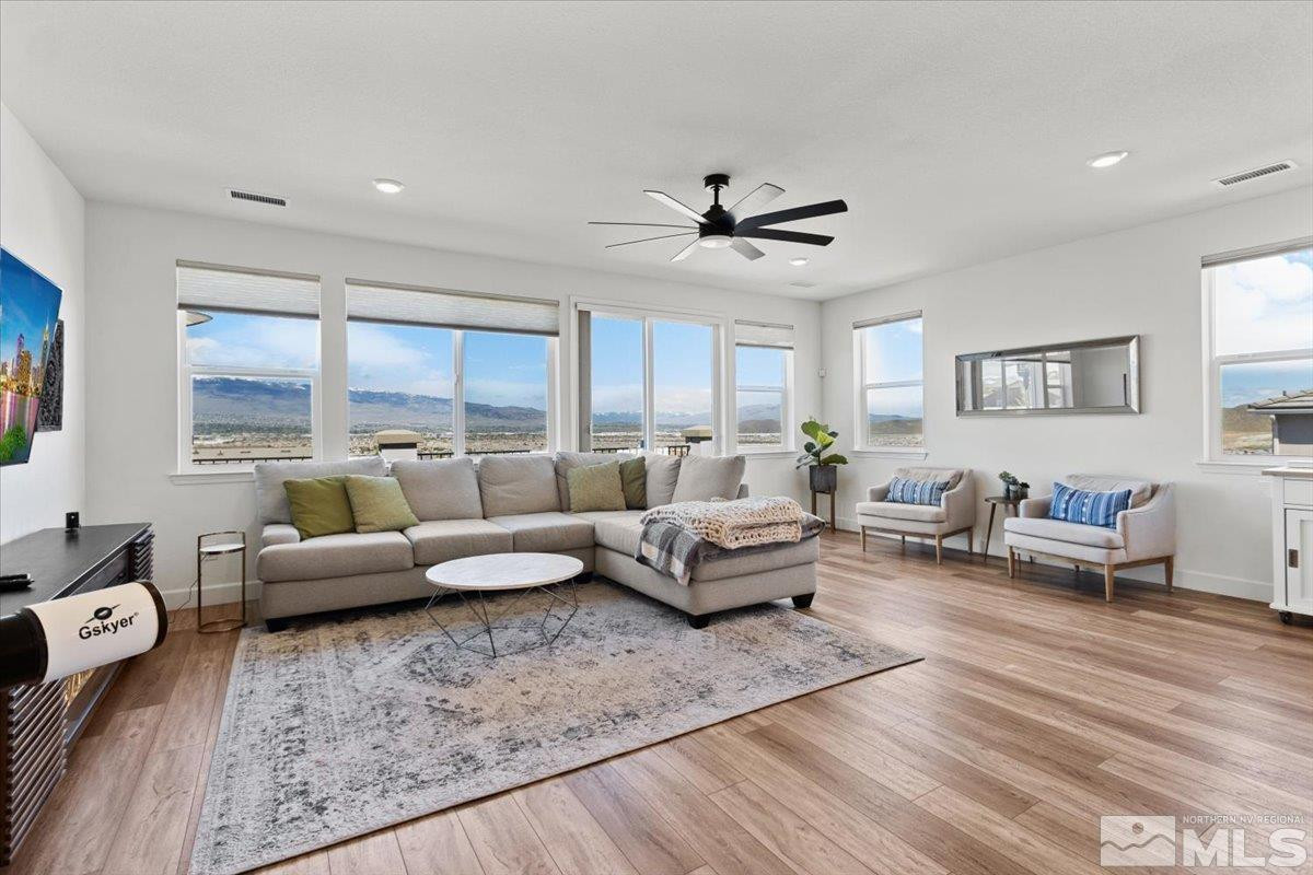 10385 Alchemy Court Reno, NV 89521 - Photo 13 of 40 a living room with furniture and a large window